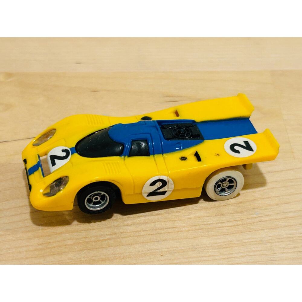 Vintage Aurora AFX HO Slot Car Porsche 917 #2 Yellow Blue